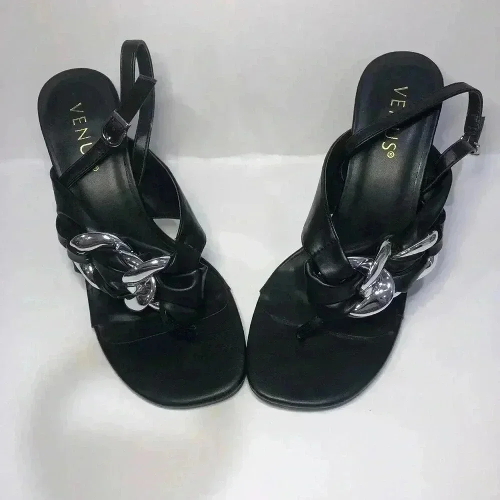 Black and silver heels size 7.5